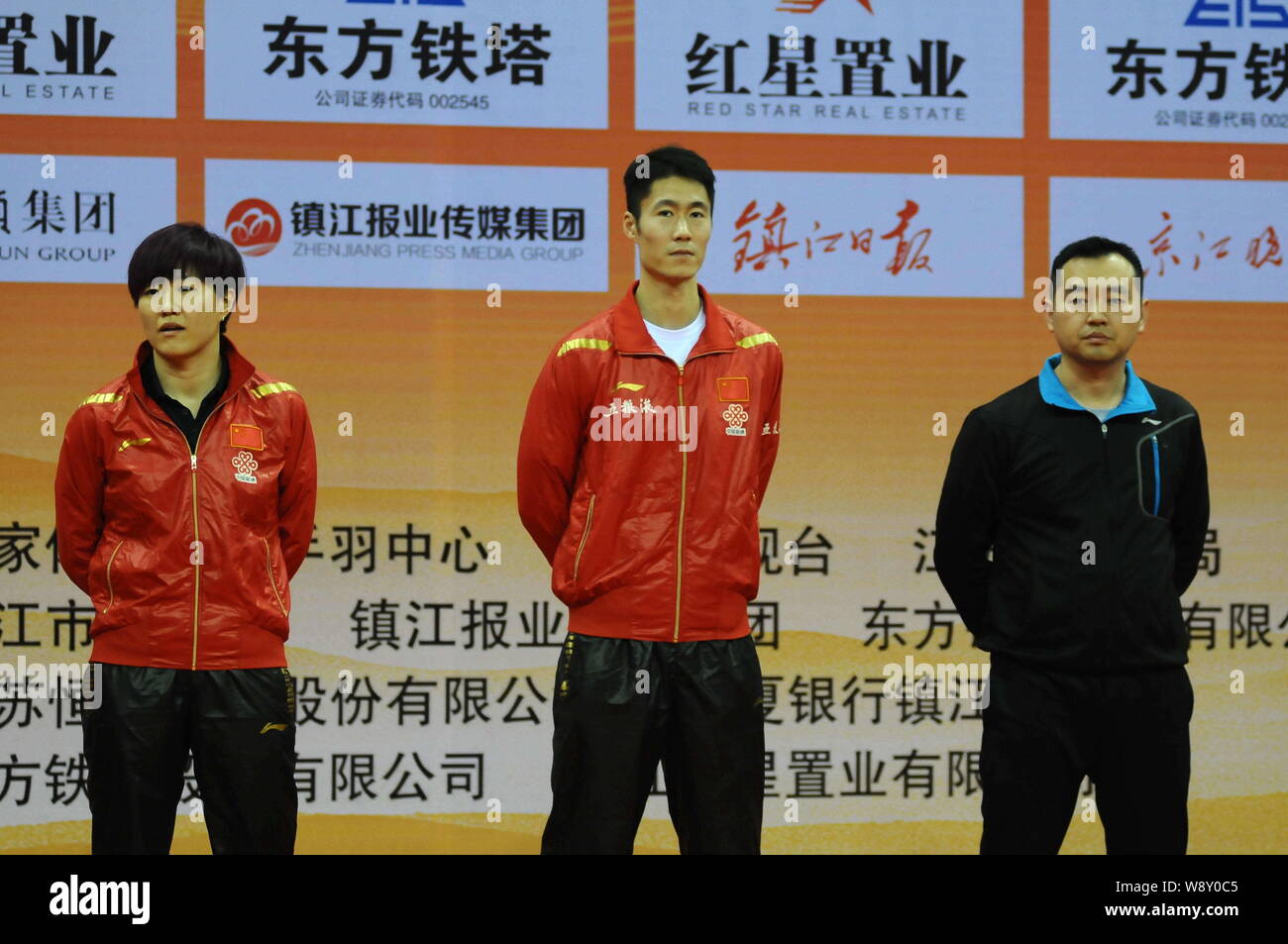 (From left) Chinese table tennis stars Guo Yan and Wang Liqin pose next to Kong Linghui, head coach of the Chinese national womens table tennis team, Stock Photo