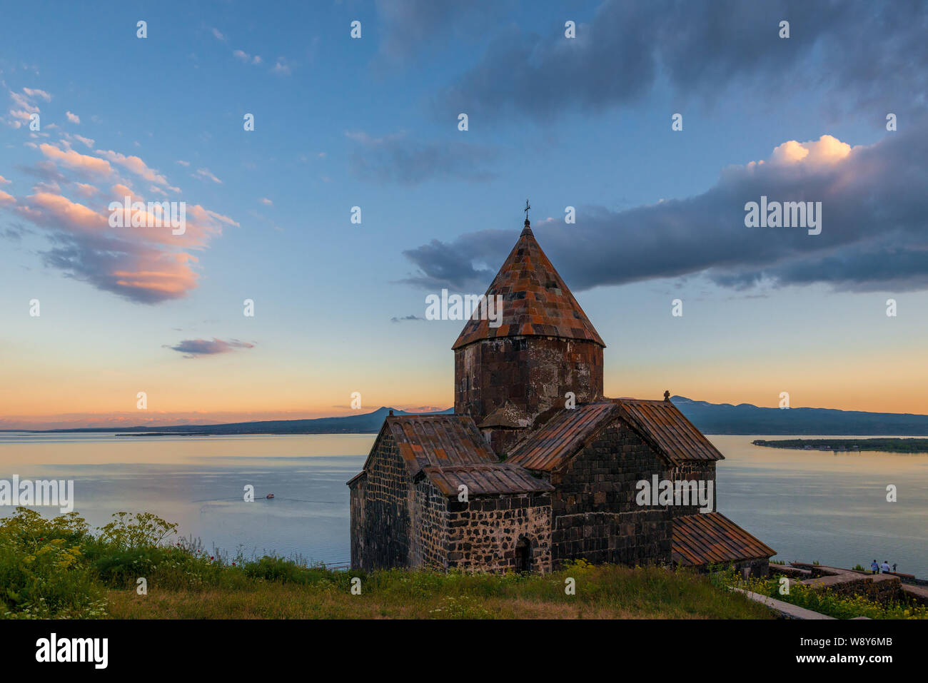Evening shot of Sevanavank Monastery at sunset on Lake Sevan, Armenia Stock Photo