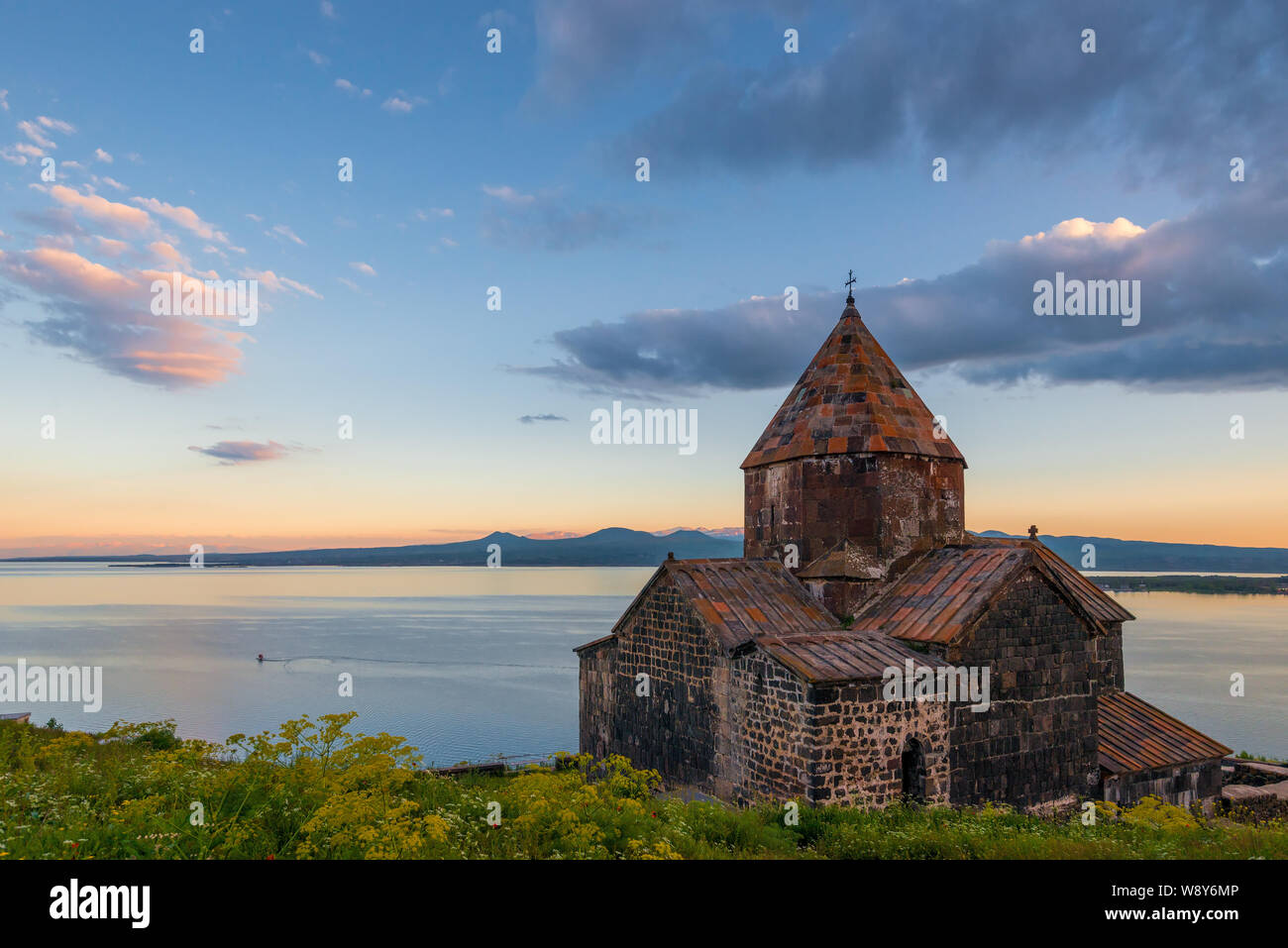 Property of Armenia famous landmark Monastery Sevanavank and Lake Sevan at sunset Stock Photo