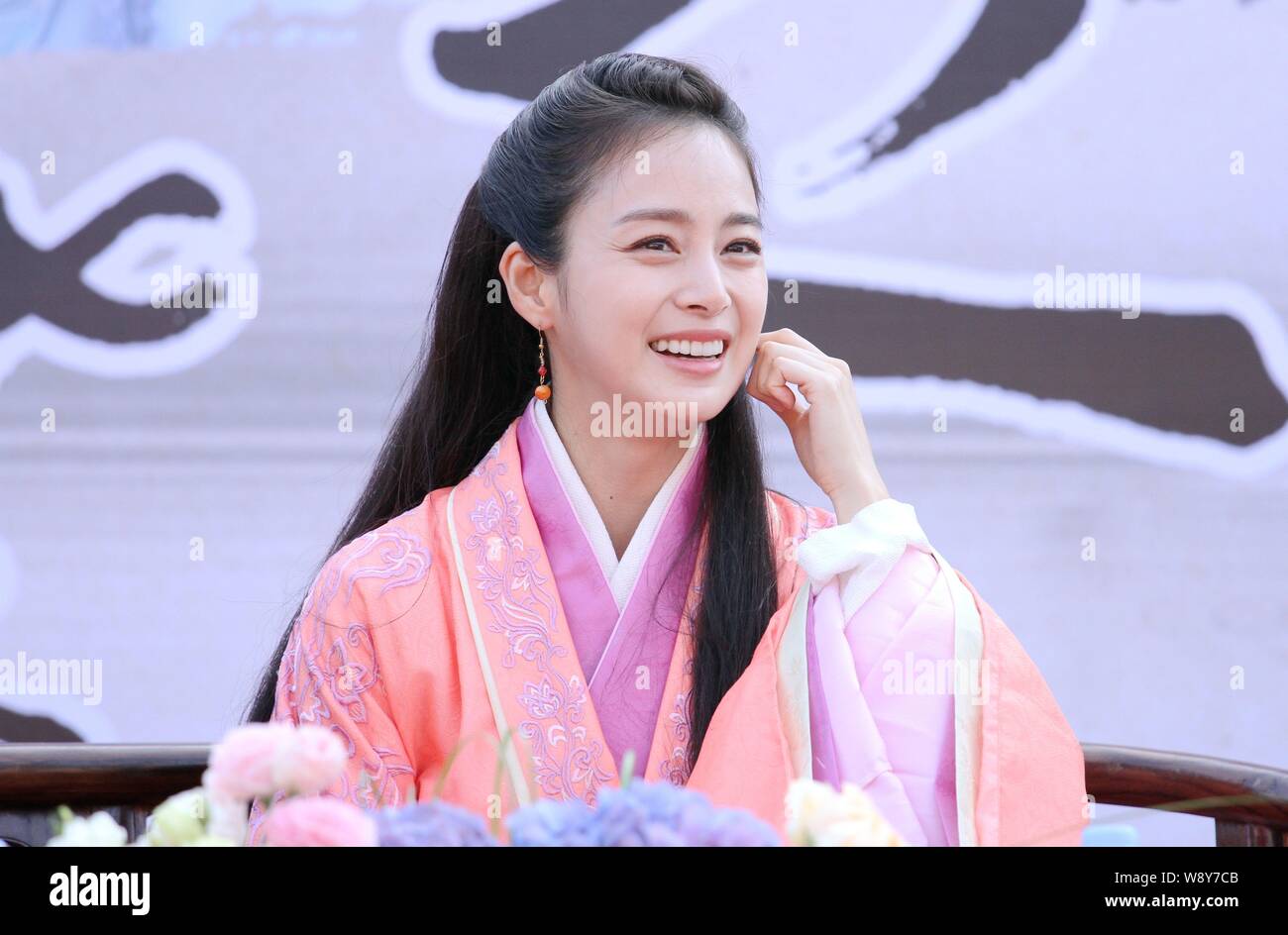 South Korean actress Kim Tae-hee laughs during a press conference for her new TV series, Shu Sheng Wang Xi Zhi, literally Calligraphy Sage Wang Xizhi, Stock Photo