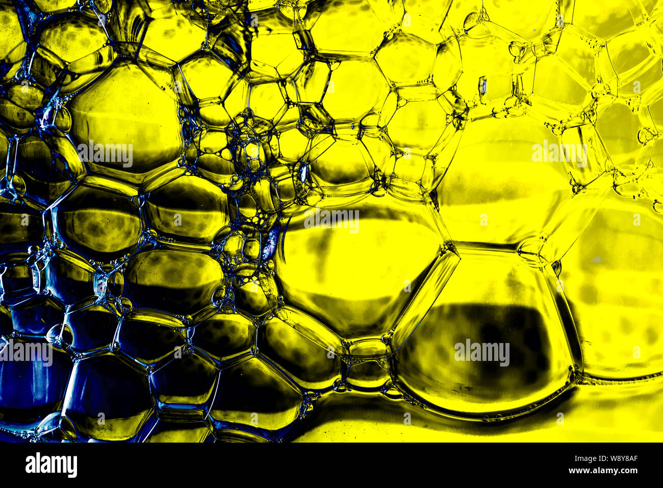 Oil bubbles inside water base form patterns Stock Photo - Alamy