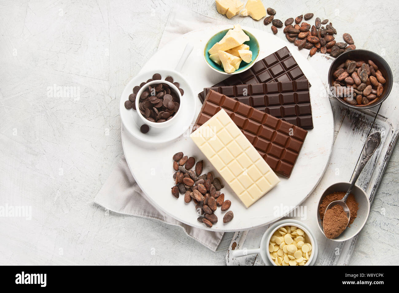 Dark bitter, milk and white chocolate, cocoa butter, cacao powder and