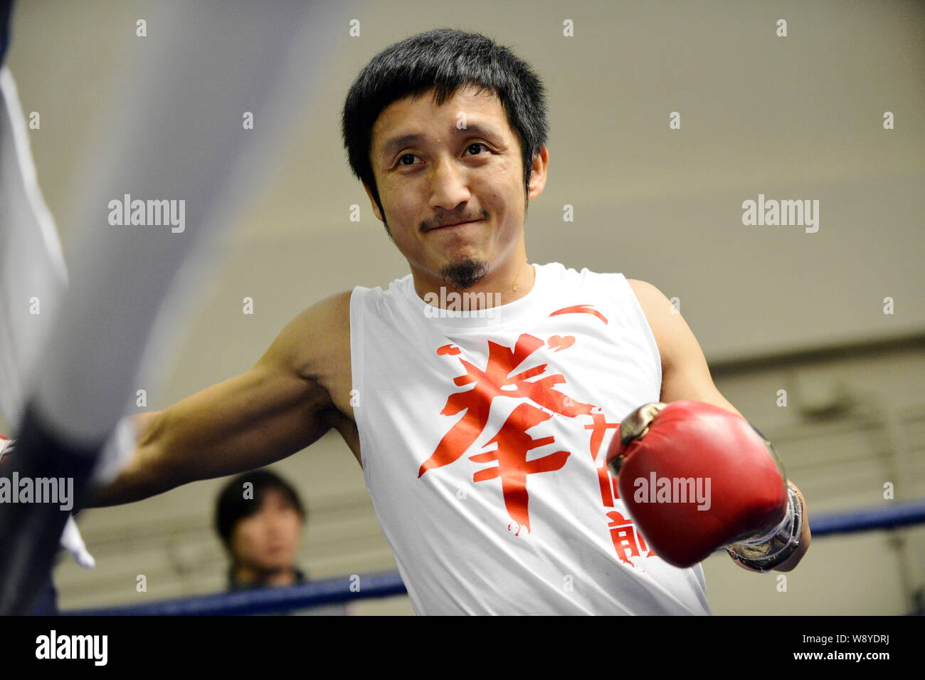 FILEChinese boxer Zou Shiming takes part in a boxing training