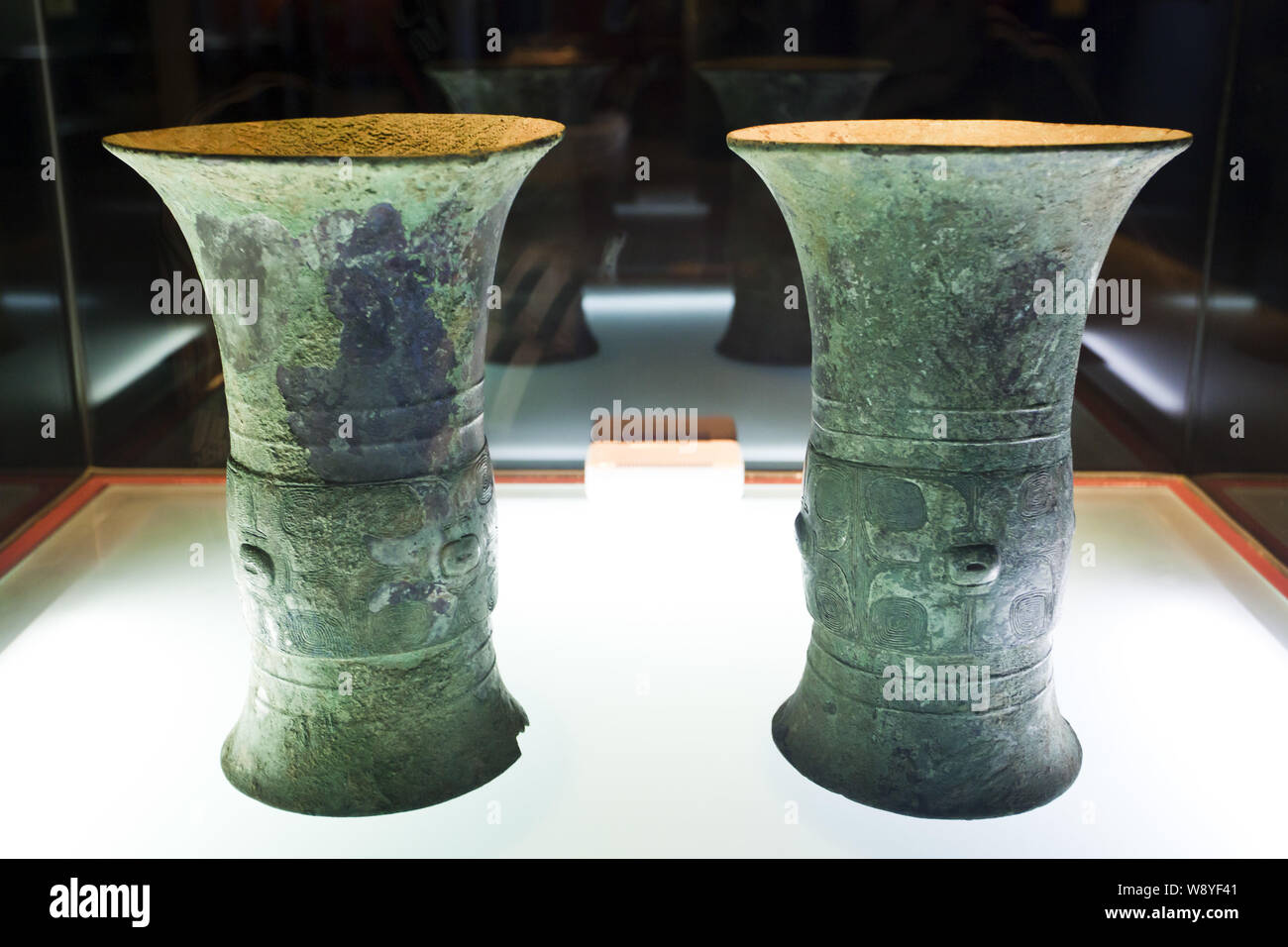 Bronze drinking vessels of the Shang Dynasty are displayed at Anyang Yin Xu Museum in Anyang city, central Chinas Henan province, May 2010. Stock Photo