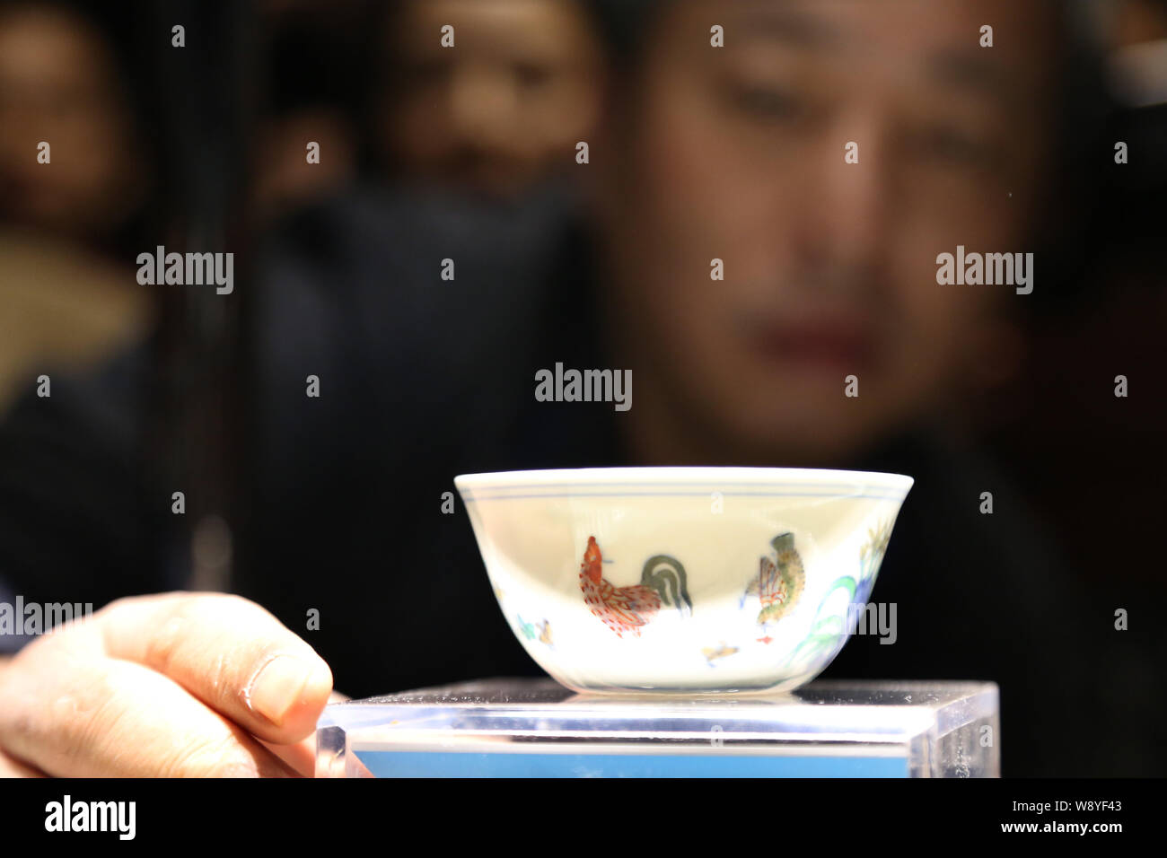 Chinese antique collector Liu Yiqian, founder of Long Museum, puts the