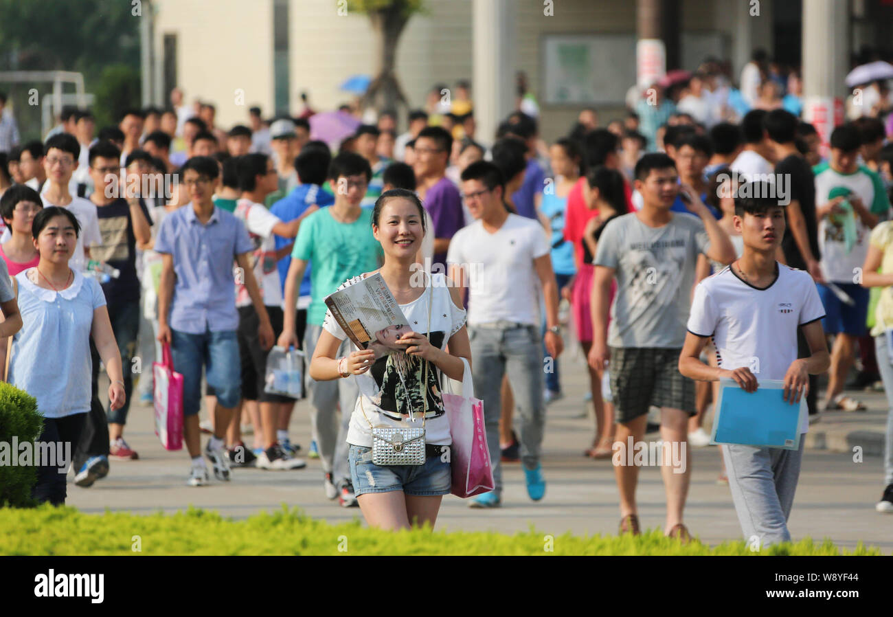 Students leave the campus after finishing the National College Entrance Exam (Gaokao) at a high school in Huaibei city, east Chinas Anhui province, 8 Stock Photo