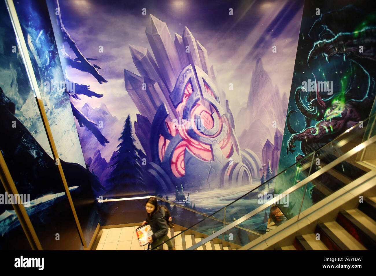 A customer walks upstairs with her food at a WorldofWarcraftthemed fastfood restaurant of