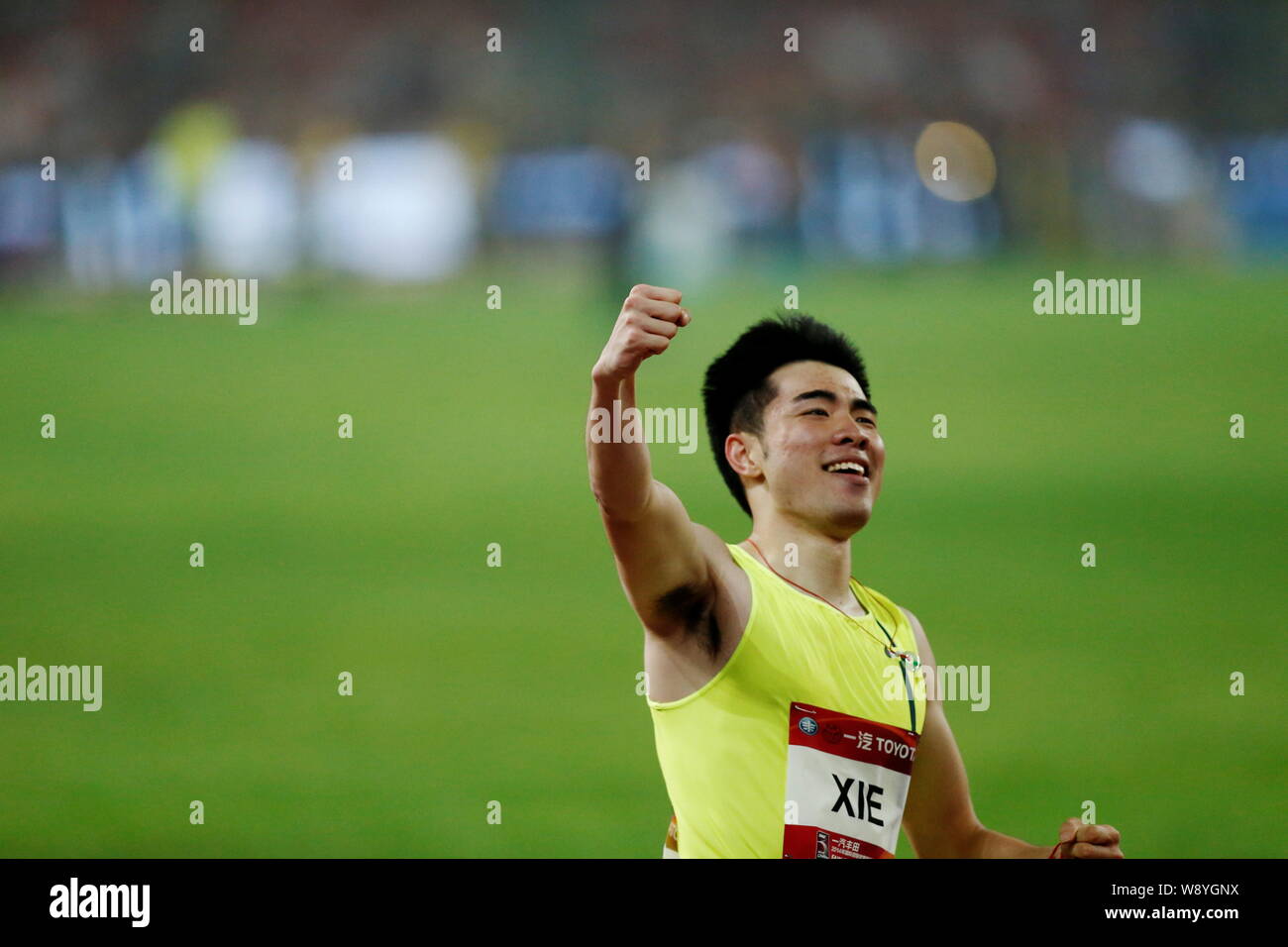Xie Wenjun of China celebrates after winning the mens 110m hurdles ...