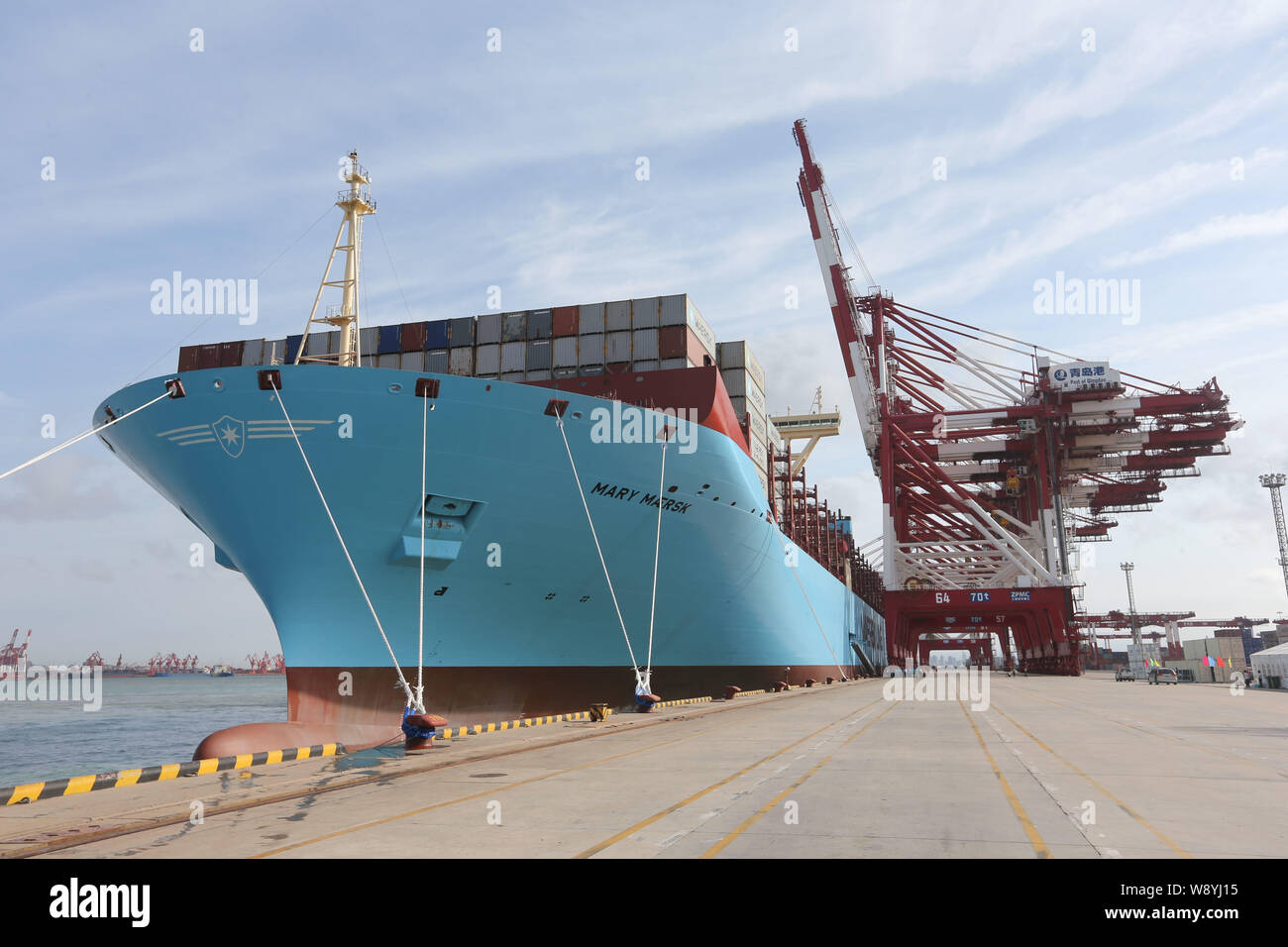 --FILE--The Mary Maersk container ship of Maersk Line docks at the Port of Qingdao in Qingdao city, east Chinas Shandong province, 18 September 2013. Stock Photo