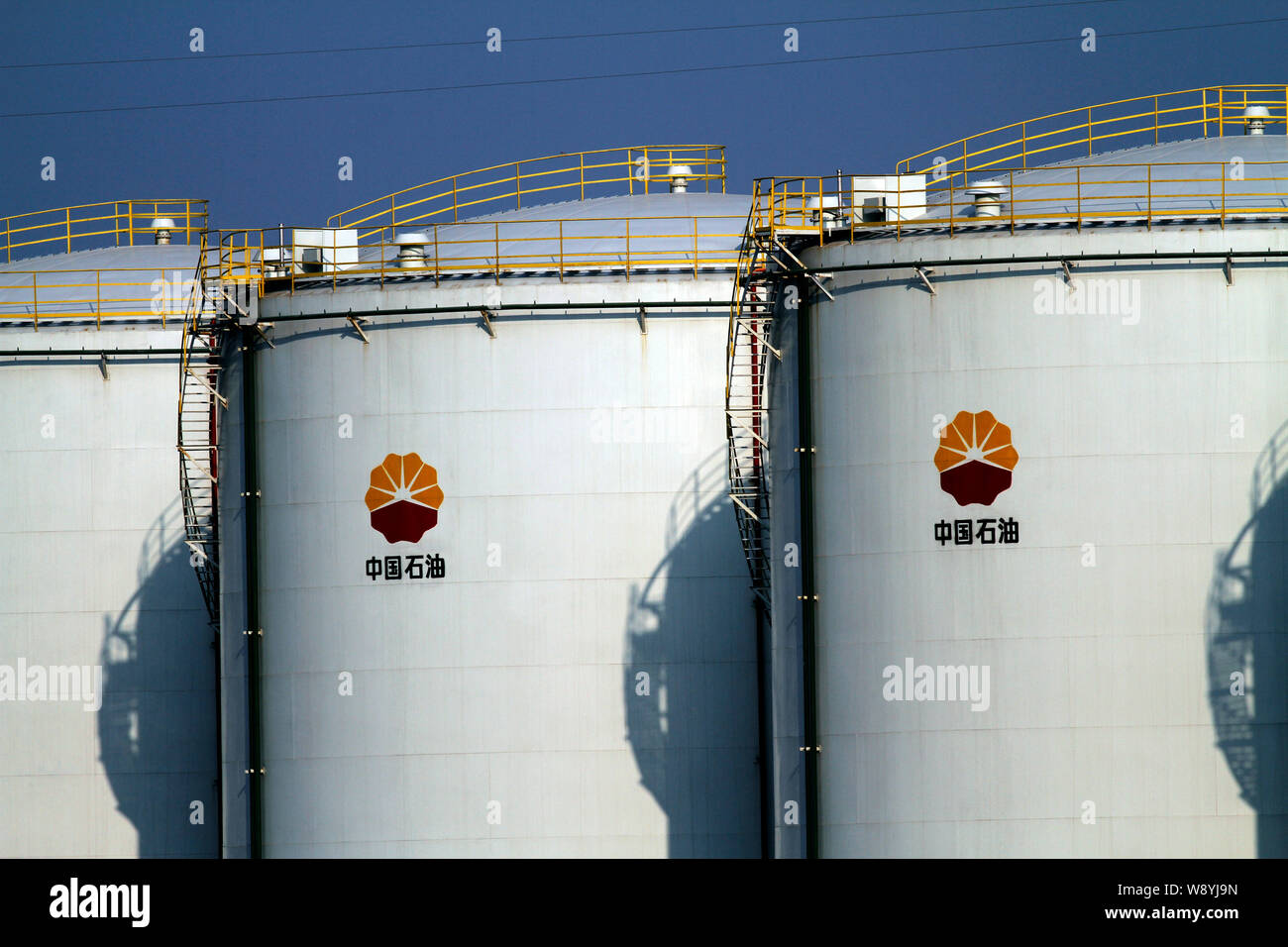 --FILE--Oil tanks are pictured at an oil storage base of CNPC (China National Petroleum Corporation) in HuaiAn city, east Chinas Jiangsu province, 1 S Stock Photo