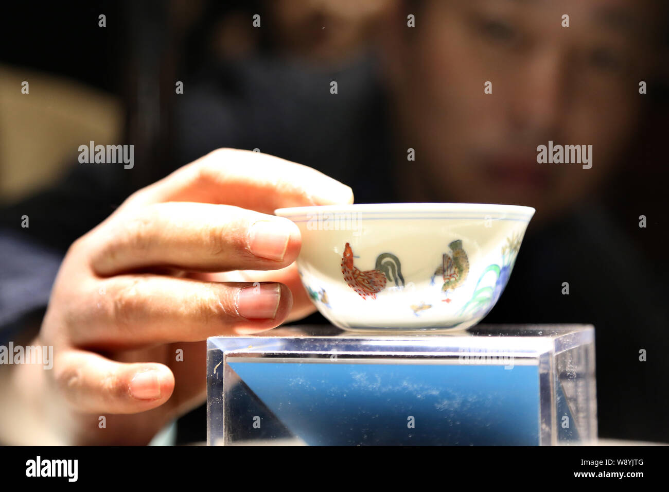 Chinese antique collector Liu Yiqian, founder of Long Museum, puts the