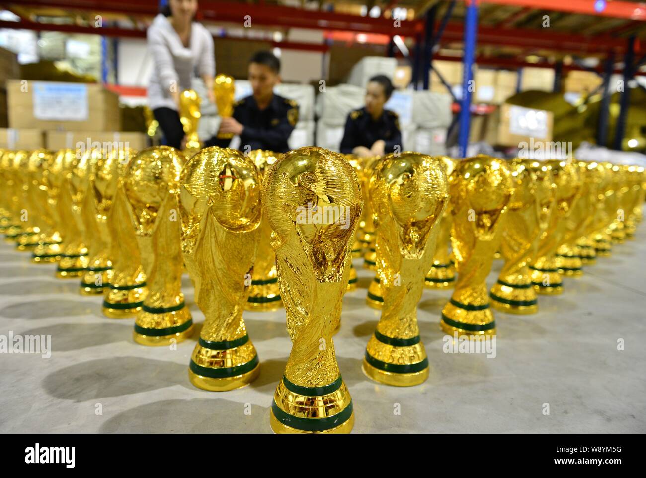 Chinese Customs Officers Count Fake World Cup Trophies They Seized At A Warehouse In Yiwu City East Chinas Zhejiang Province 16 April 14 More T Stock Photo Alamy