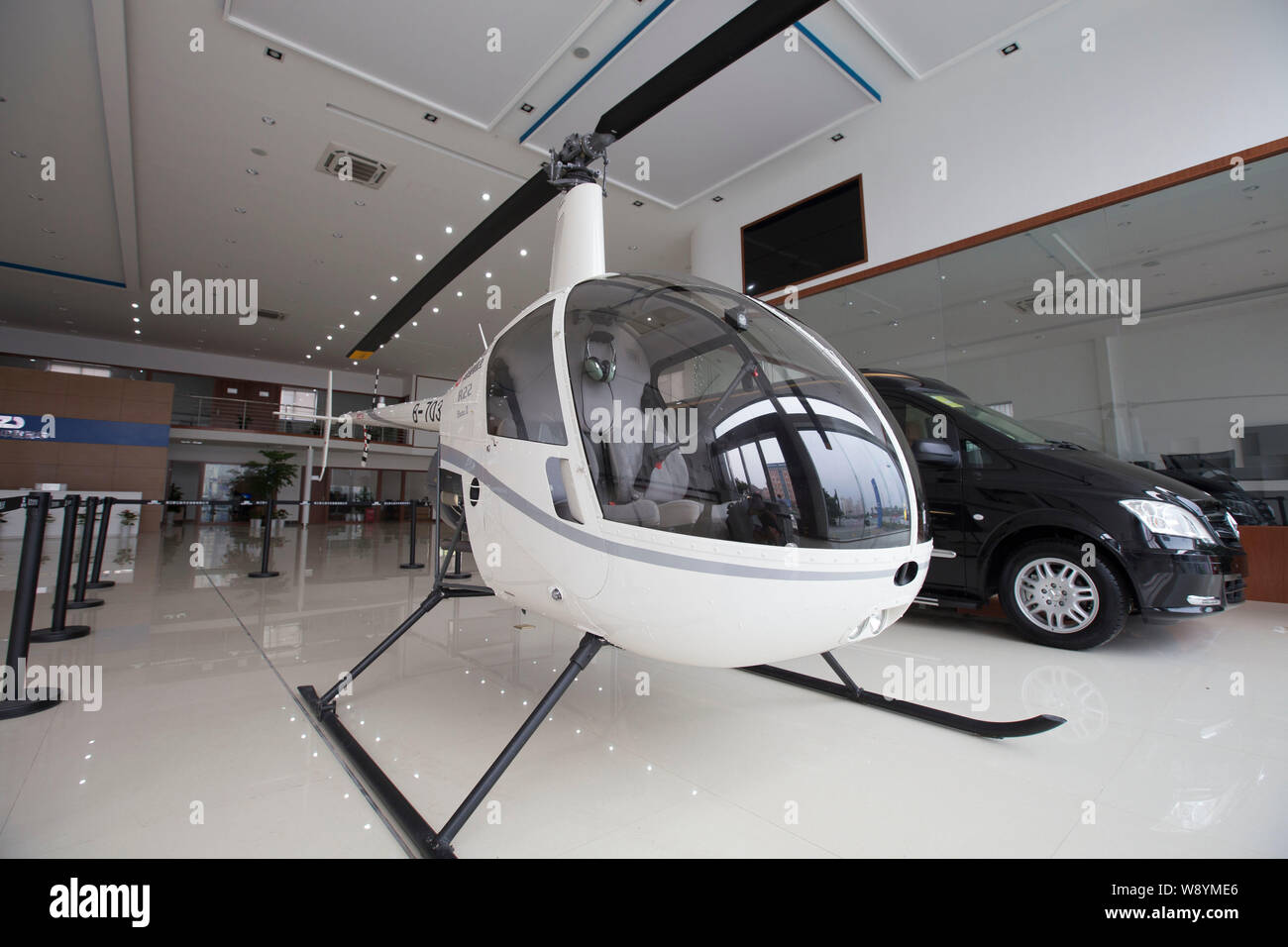 An R22 Beta O Helicopter Manufactured By Robinson Helicopter Co Is For Sale At A Car Dealership In Hangzhou City East Chinas Zhejiang Province 11 A Stock Photo Alamy
