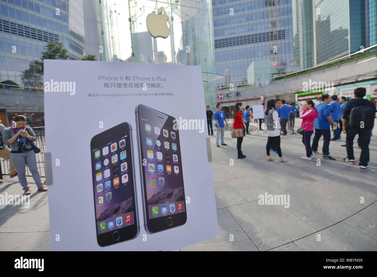An advertisement for iPhone 6 and iPhone 6 Plus smartphones is seen outside the Apple Store in the Lujiazui Financial District in Pudong, Shanghai, Ch Stock Photo