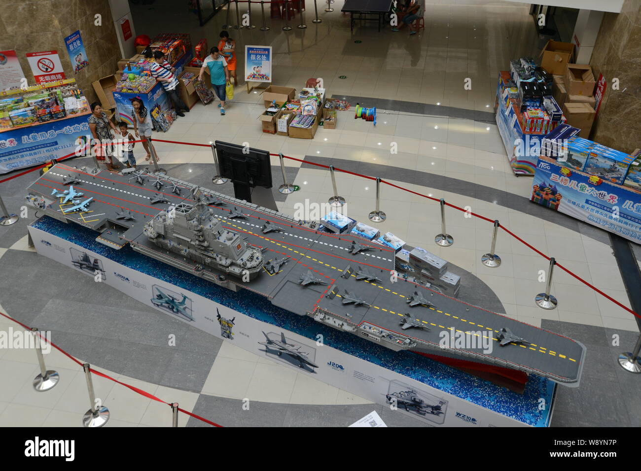 A model of the Liaoning Aircraft Carrier made from Lego bricks is seen on display at a shopping mall in Shenyang city, northeast Chinas Liaoning provi Stock Photo