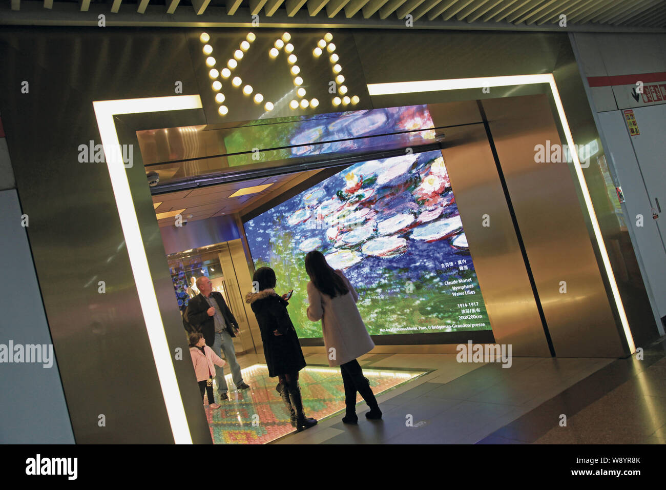 FILE--Customers enter the K11 Art Mall in Shanghai, China, 10