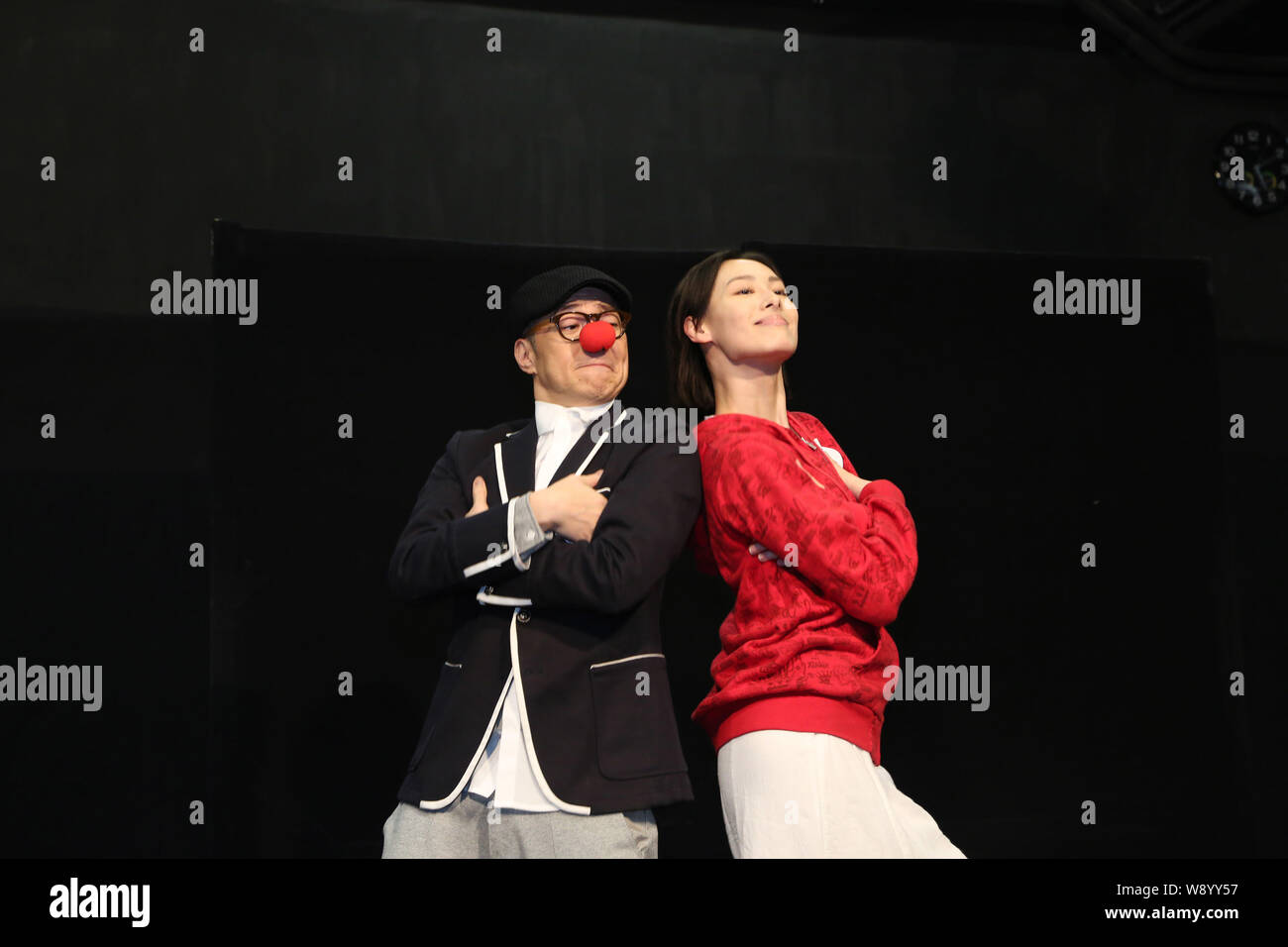 Hong Kong actress Isabella Leong, right, and Hong Kong actor Jim Chim perform during a rehearsal for their theatre drama, Sign of Happiness, in Hong K Stock Photo