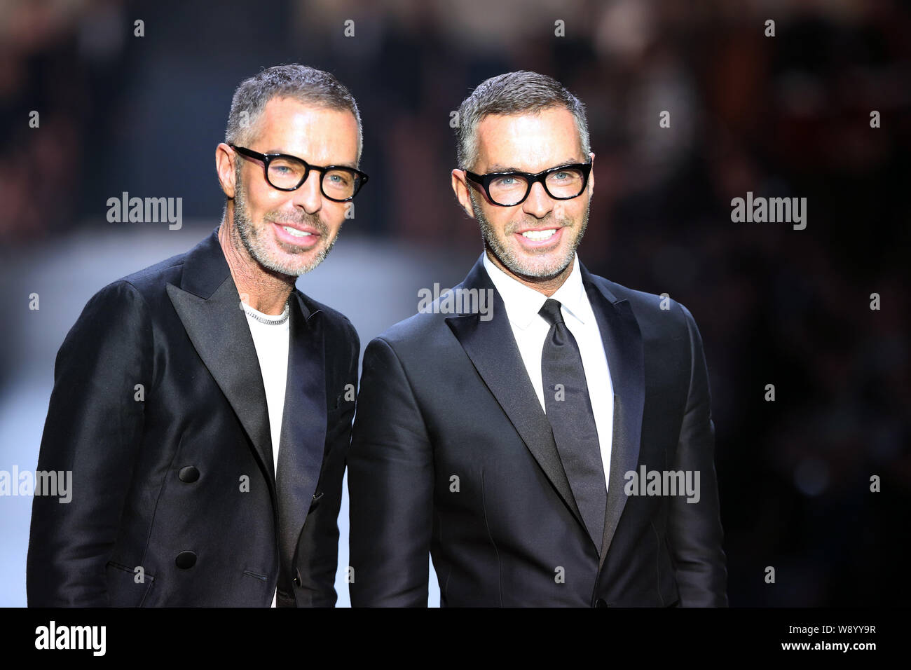 Canadian fashion designers Dean and Dan Caten are pictured at the Dsquared2  fashion show during the Shanghai Fashion Week Fall/Winter 2014 in Shanghai  Stock Photo - Alamy