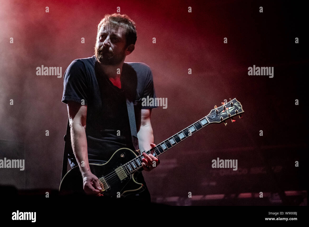 Skanderborg, Denmark. 10th, August 2019. The English rock band Suede  performs a live concert during the Danish music festival SmukFest 2019 in  Skanderborg. Here guitarist Richard Oakes is seen live on stage. (