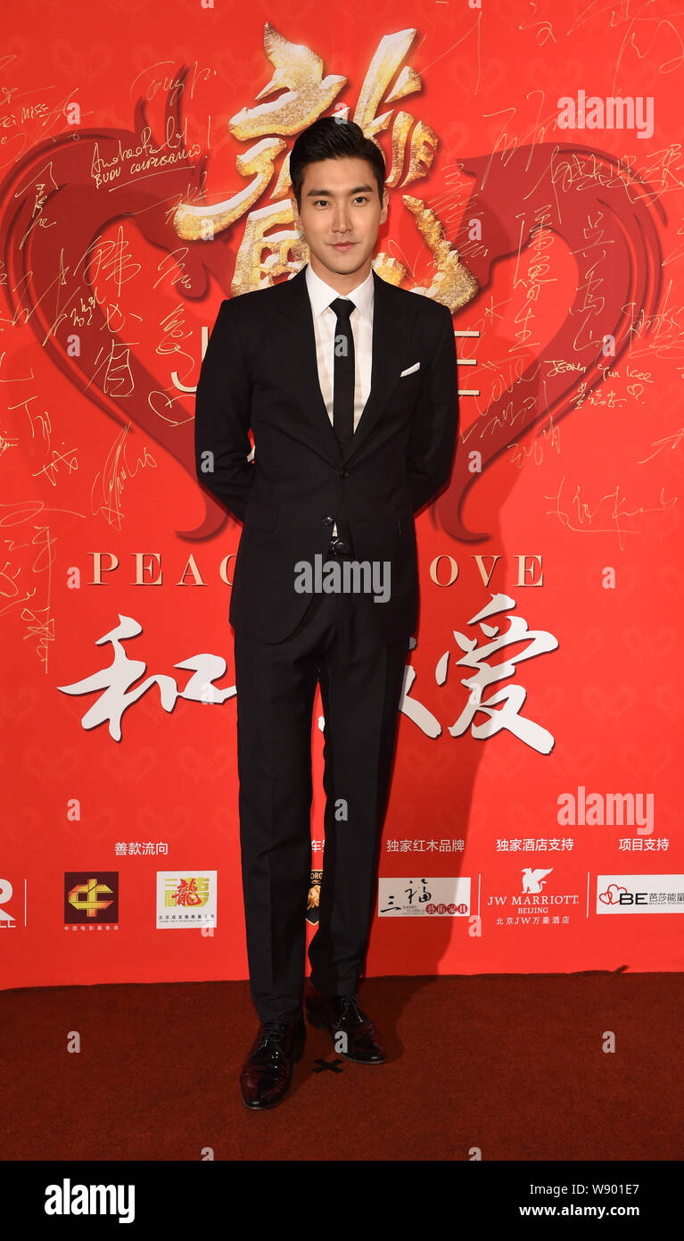 South Korean actor Choi Si-won poses as he arrives for the Peace & Love