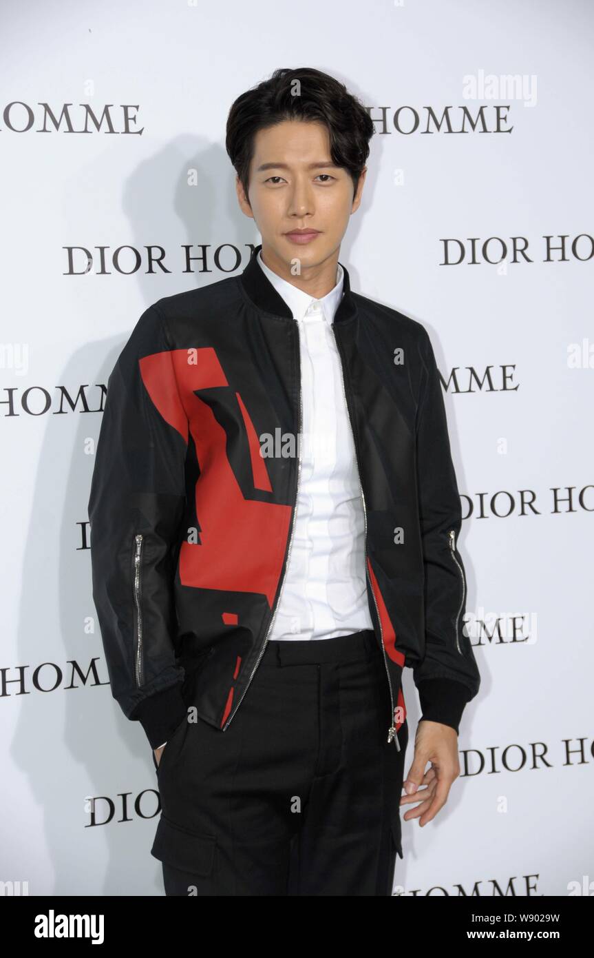 South Korean actor Park Hae-jin poses as he arrives for the Dior Homme ...