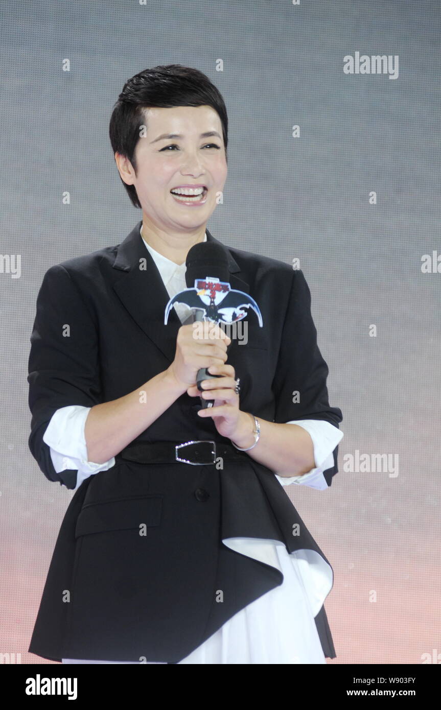 Chinese actress Jiang Wenli laughs during a press conference for the ...