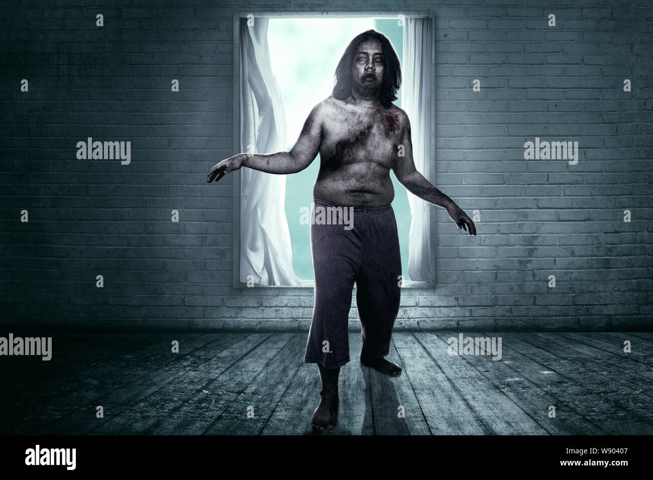 Scary zombies with blood and wound on his body haunted the abandoned