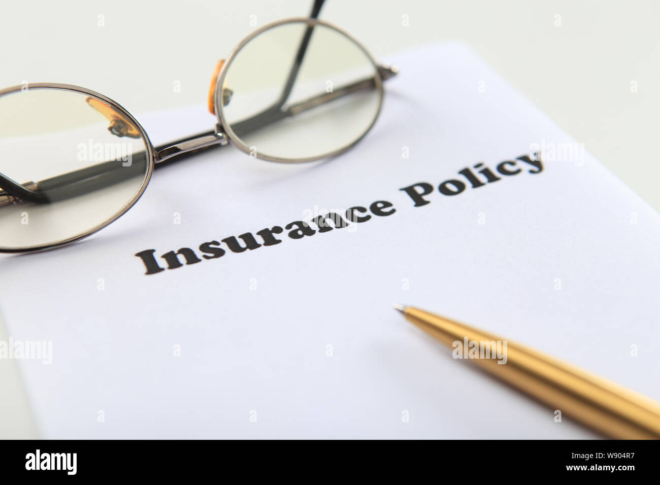 Insurance policy documents Stock Photo - Alamy
