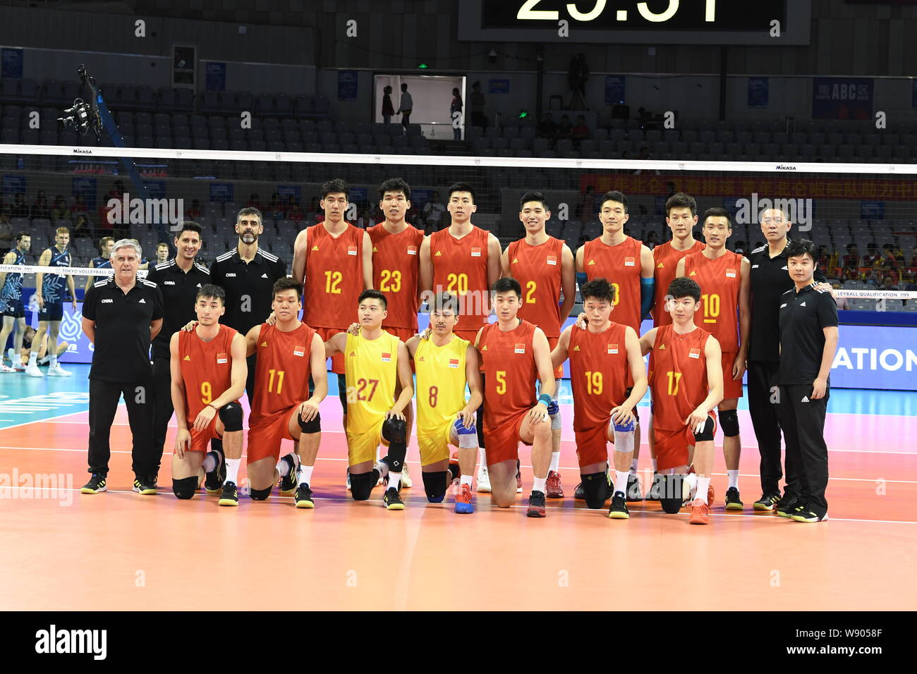 China men's national volleyball team pose to photo before the Tokyo 2020 Olympics volleyball qualification against Finland in Ningbo city, east China's Zhejiang province, 3 August 2019. China won the match against Finland 3-1 at Tokyo 2020 Olympics volleyball qualification in Ningbo city, east China's Zhejiang province, 3 August 2019. Stock Photo