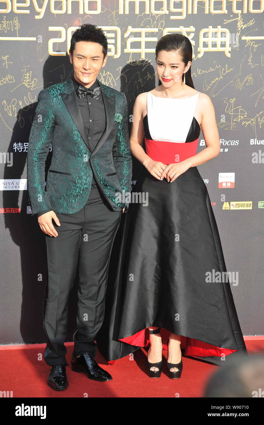 Chinese actor Huang Xiaoming, left, and actress Li Bingbing pose on the