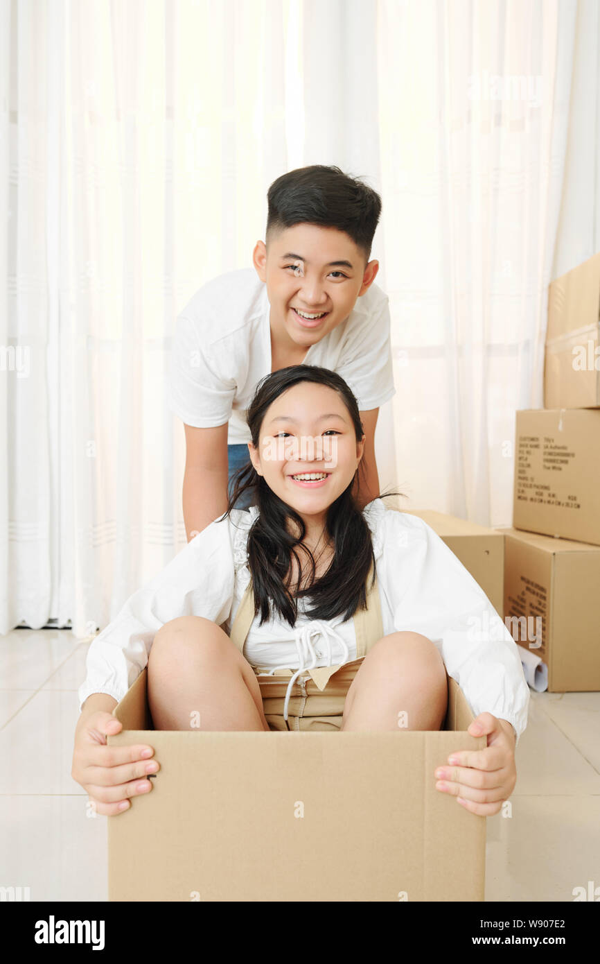 Children With Box Children playing with boxes hi-res stock photography and images - Alamy