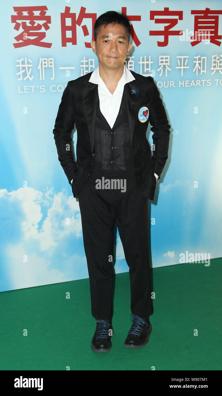 Hong Kong actor Tony Leung Chiu Wai attends the 10th Anniversary Hong Kong Kagyu Monlam in Hong Kong, China, 9 September 2014. Stock Photo