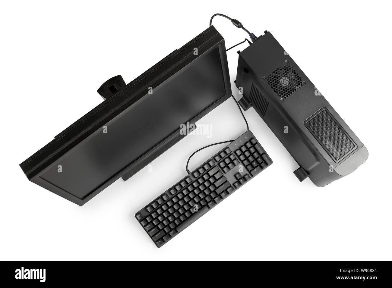 Black desktop computer with monitor and keyboard top view. Isolated on white, clipping path included Stock Photo