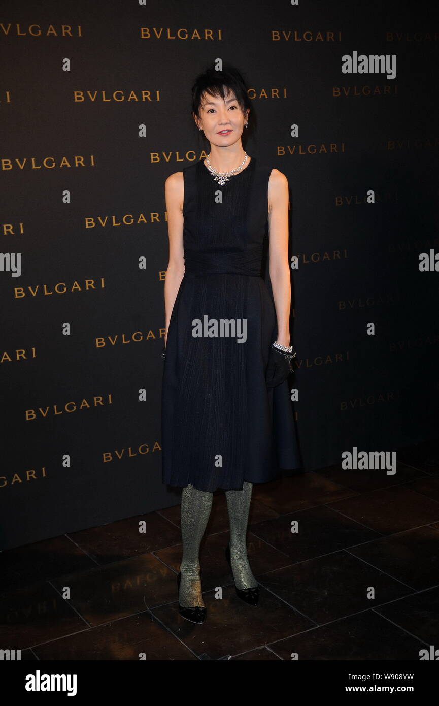 Hong Kong actress Maggie Cheung poses as she arrives at the Bulgari DIVA jewelry show in Beijing, China, 9 January 2014. Stock Photo