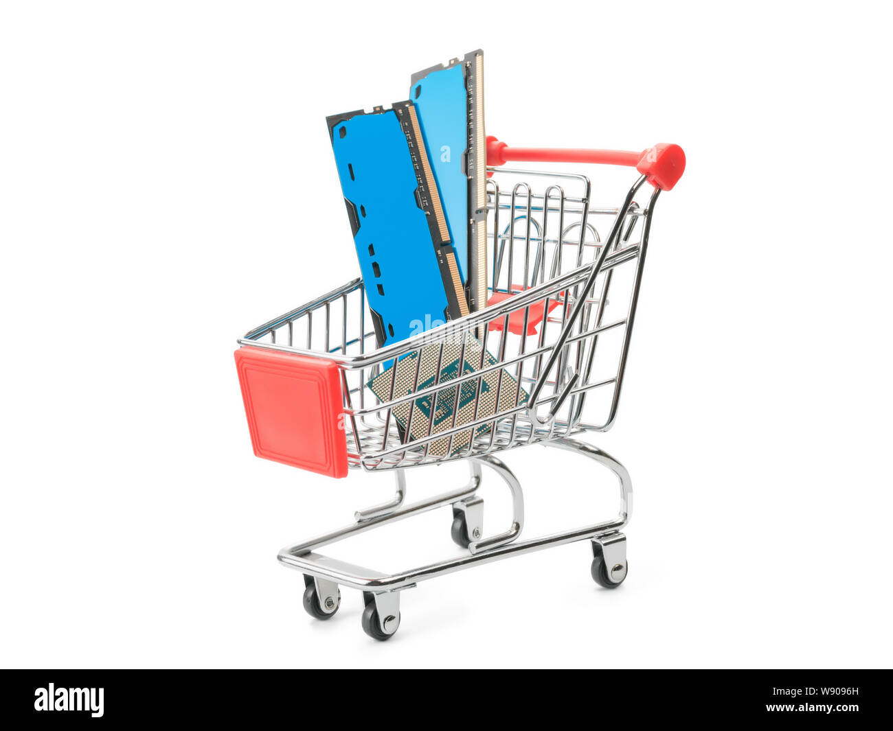 Toy shopping cart with computer parts. Isolated on white Stock Photo