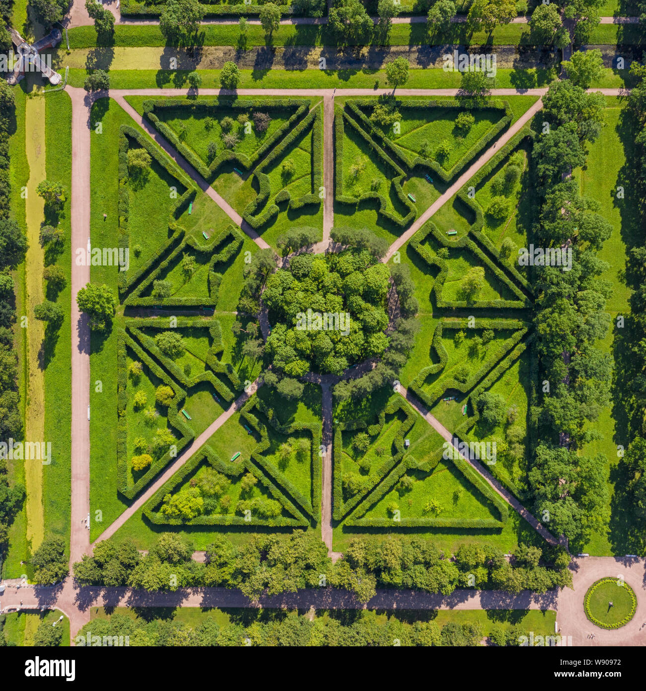 Square fragment of green garden aerial top view at day Stock - Alamy