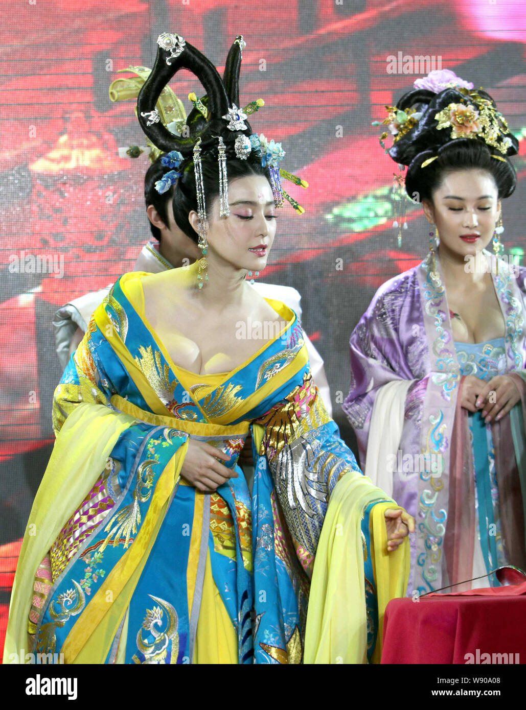 Chinese actress Fan Bingbing, left, dressed in ancient Chinese costume of Tang Dynasty, attends a press conference for her new TV series, The Empress Stock Photo