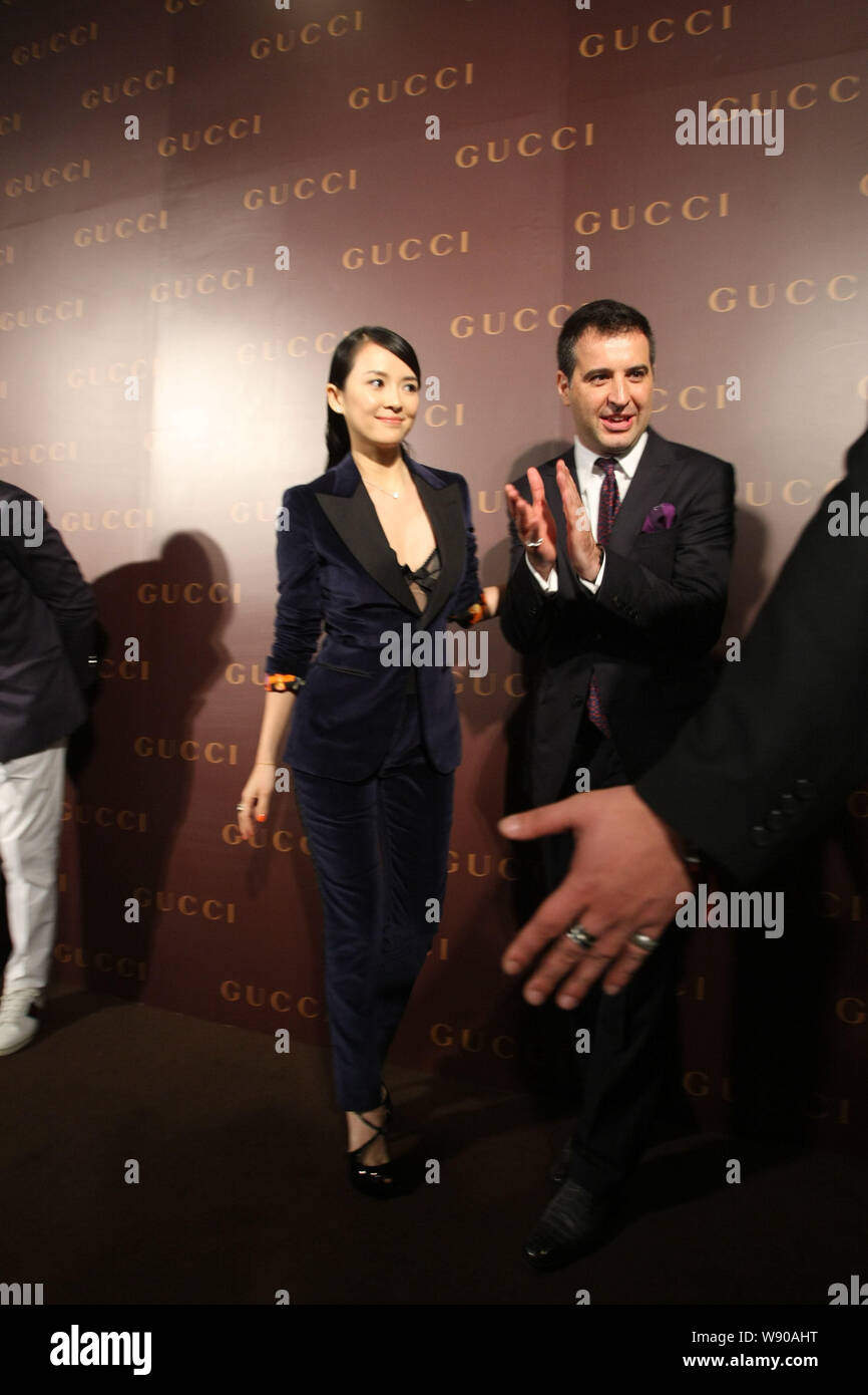 Chinese actress Zhang Ziyi, left, is pictured as she arrives at the opening ceremony for the fashion store of Gucci at iapm shopping mall in Shanghai, Stock Photo