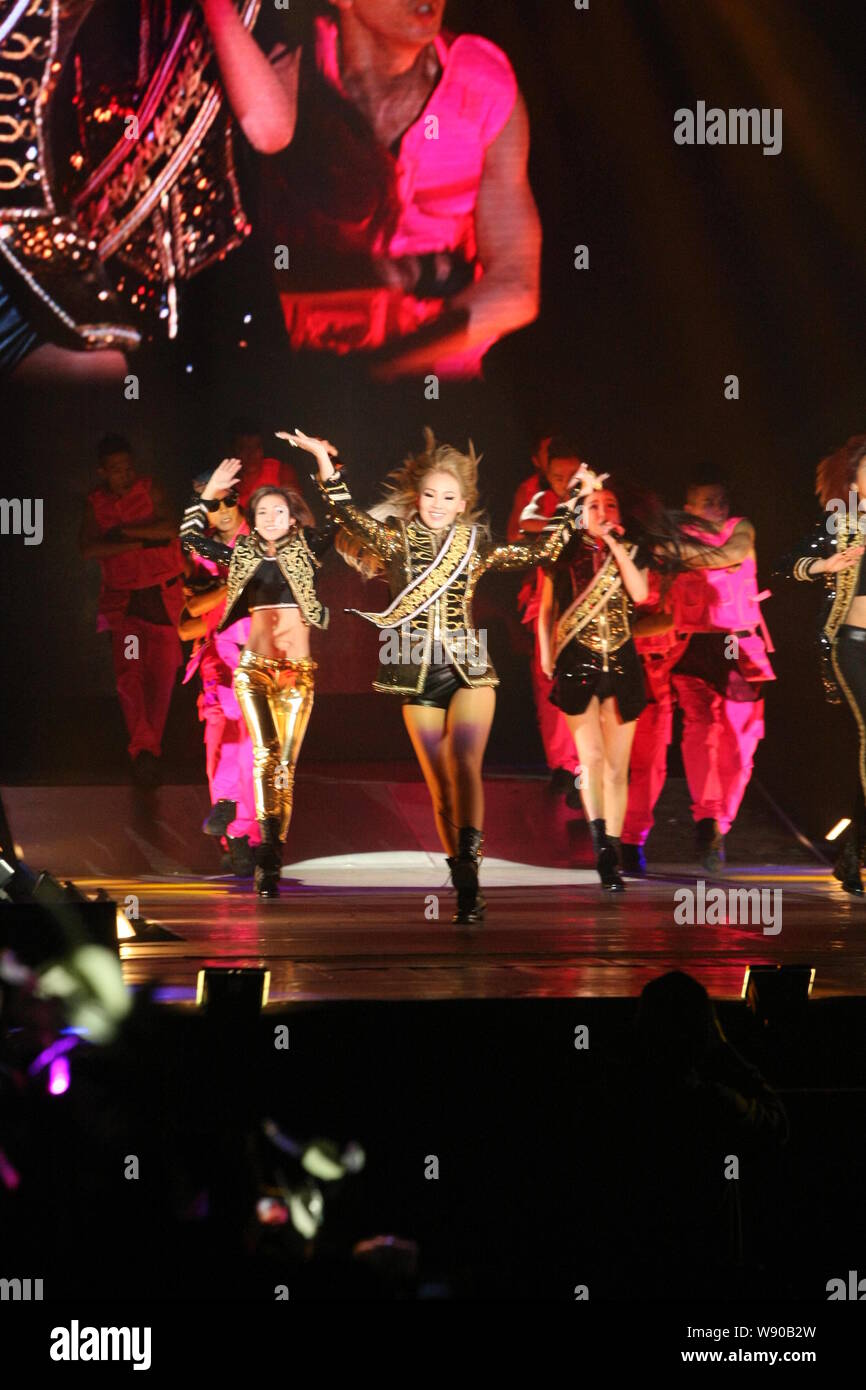 Members of South Korean girl group 2NE1 perform during the concert of ...