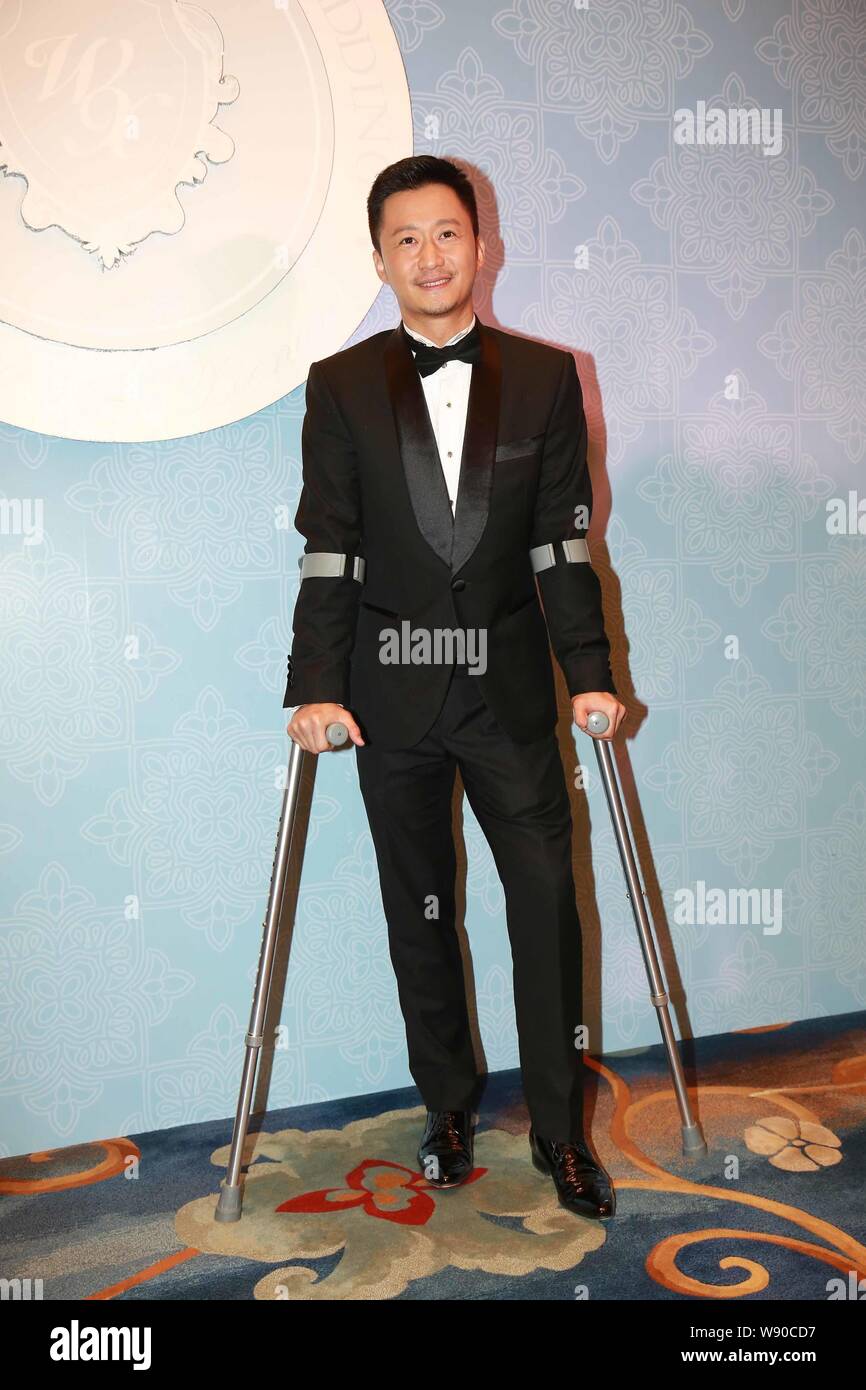 Chinese actor Wu Jing is pictured on crutches at the wedding ceremony