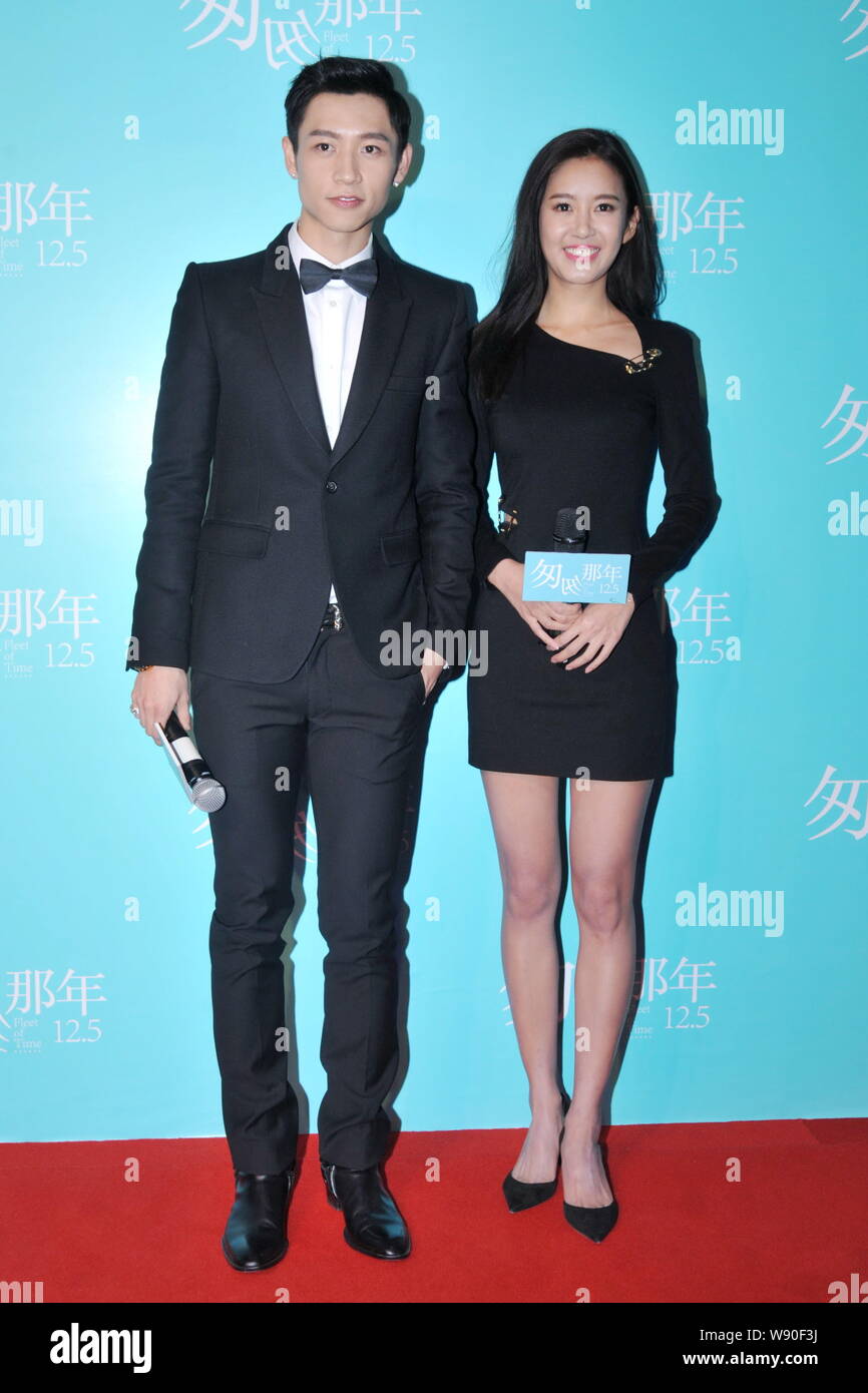 Chinese Actress Zhang Zixuan, Right, And Actor Wei Chen Pose On The Red  Carpet As They Arrive For The Premiere Of Their New Movie 