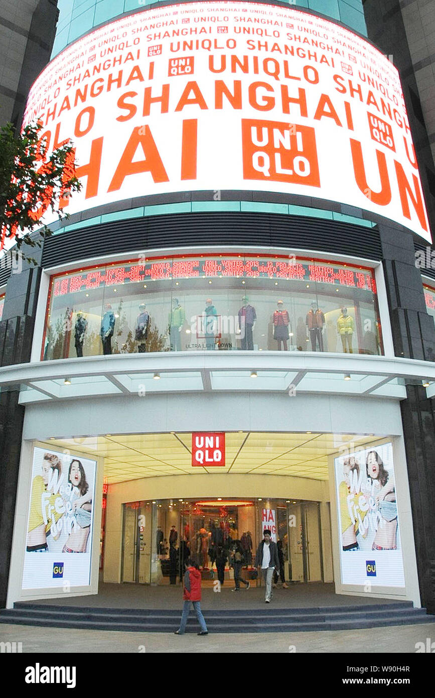 FILE--View of a flagship store of Uniqlo on Huaihai Road in Shanghai, China,  31 October 2013. If ever there were a poster child for consumer-pric Stock  Photo - Alamy