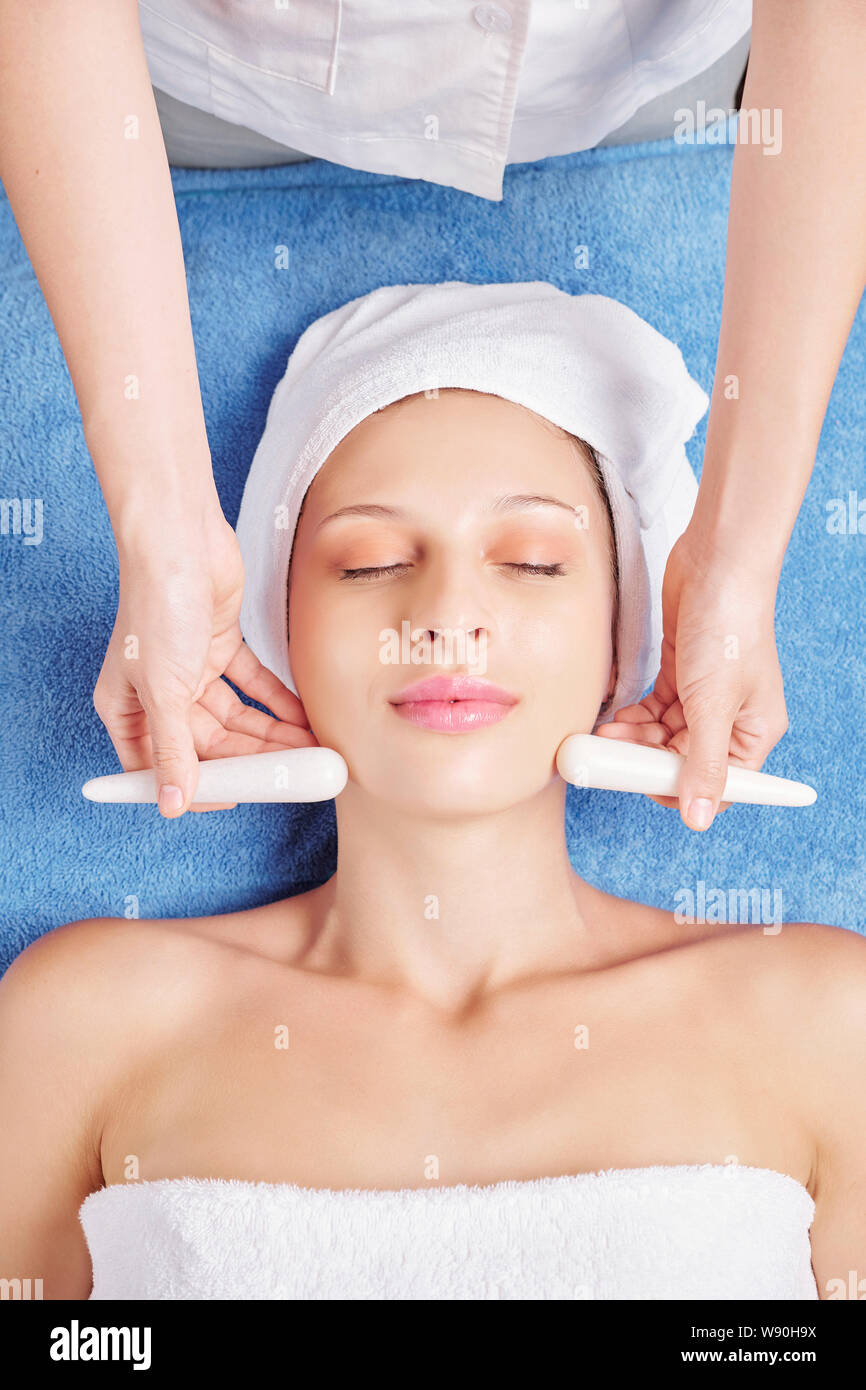 Stone sticks massage Stock Photo Alamy