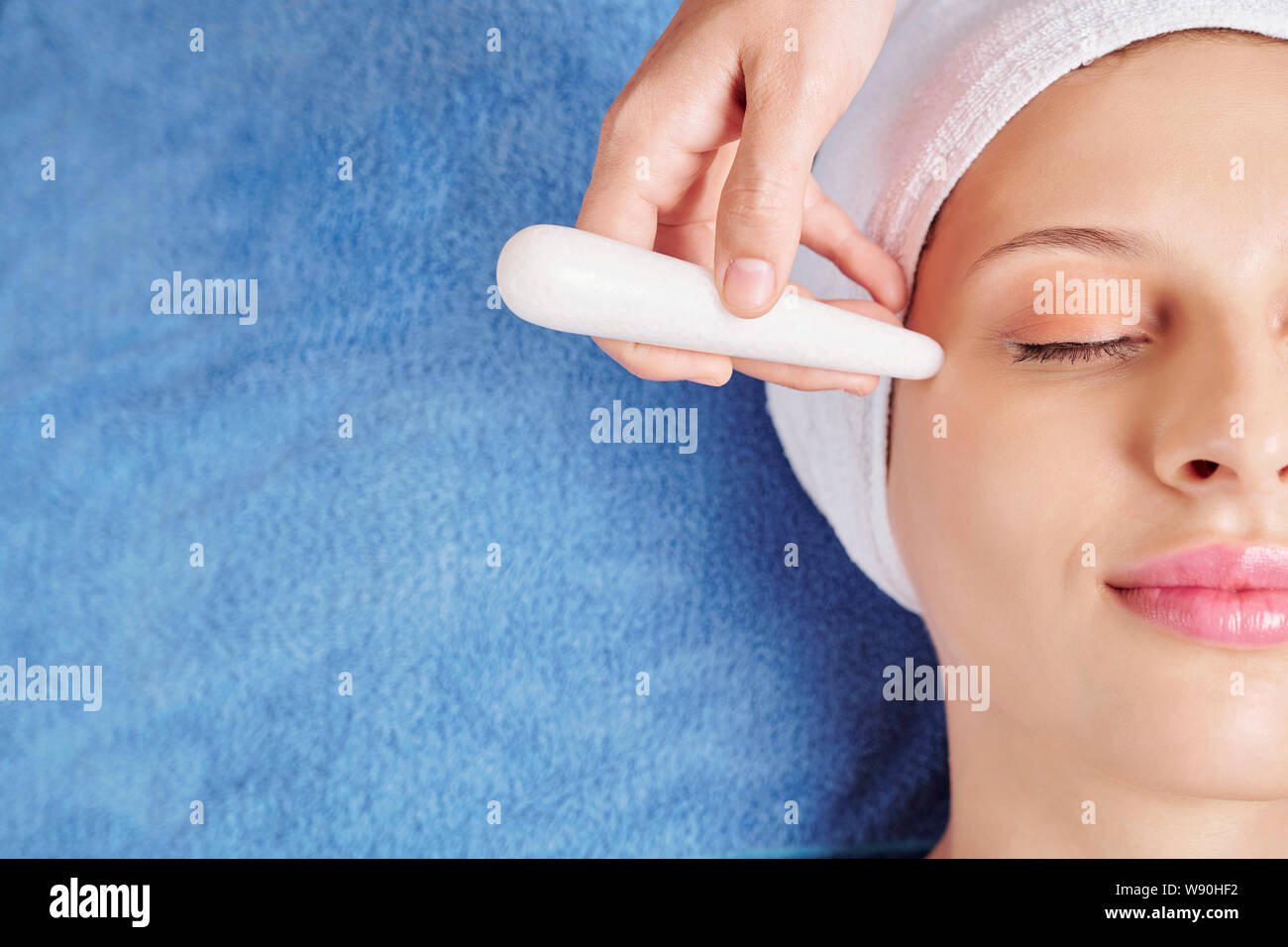 Rejuvenating stick massage Stock Photo Alamy