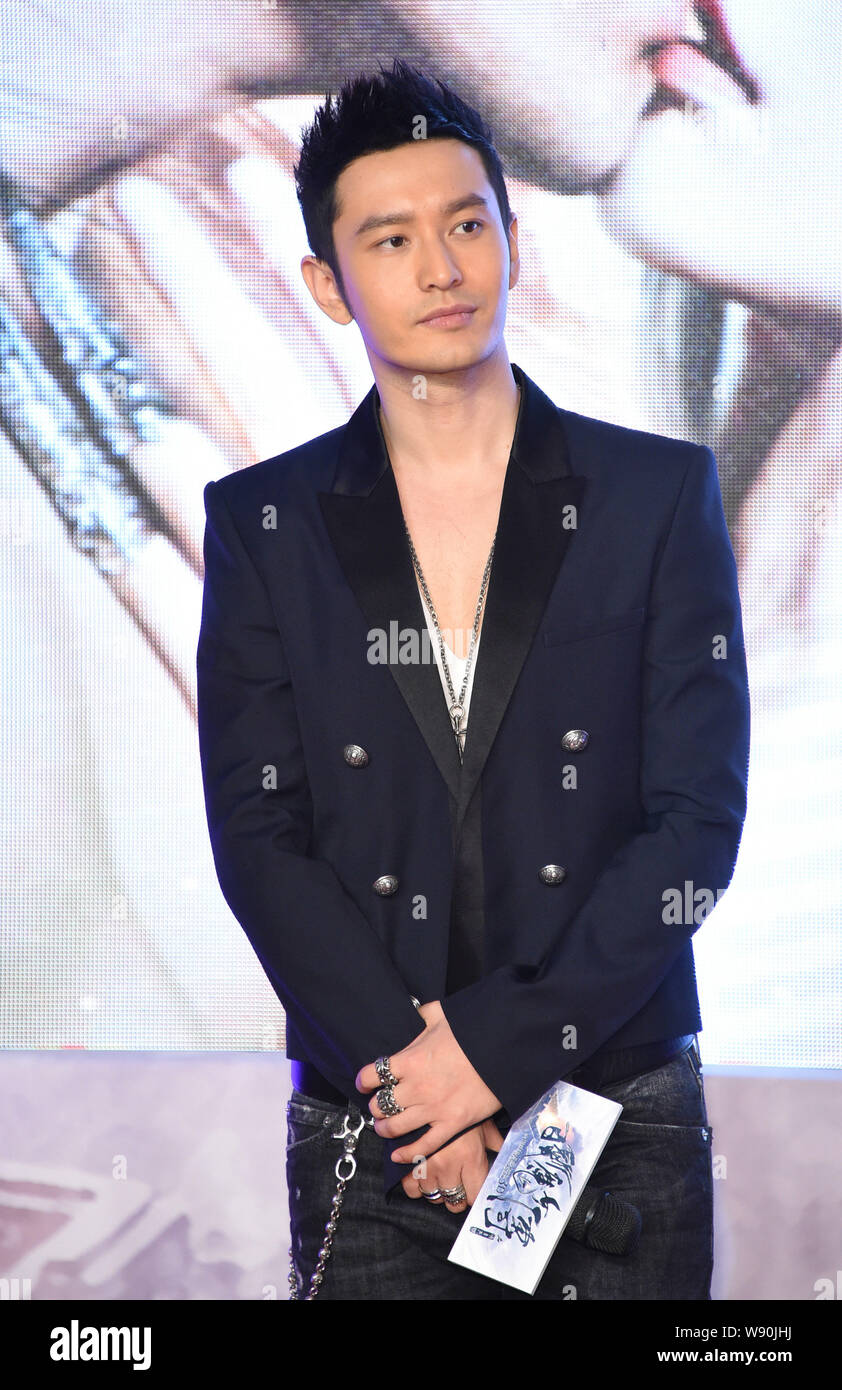 Chinese Actor Huang Xiaoming Poses During A Premiere For His New