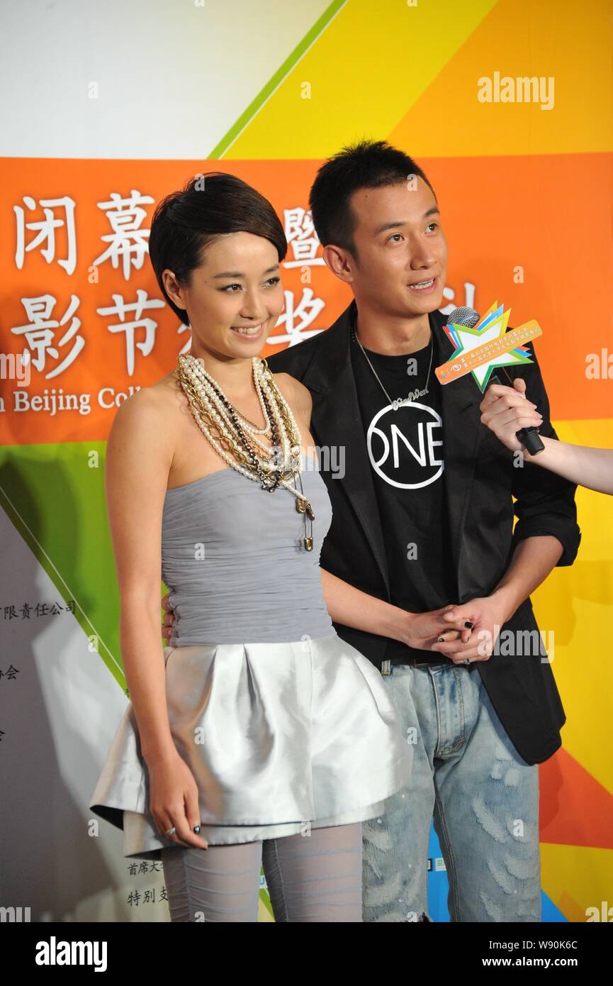--FILE--Chinese actor Wen Zhang, right, and his actress wife Ma Yili attend the awarding ceremony of the 18th Beijing Student Film Festival in Beijing Stock Photo