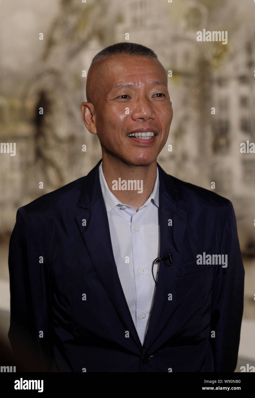 Chinese artist Cai Guoqiang is pictured after his firework art show ...
