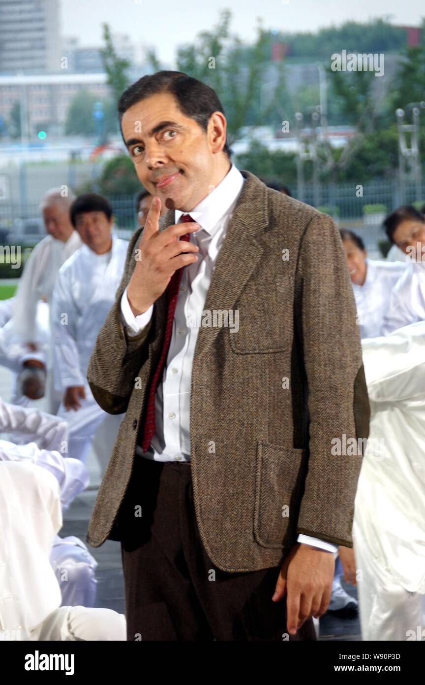 English actor Rowan Atkinson plays Mr. Bean during a filming session for a TV commercial at the Mercedes-Benz Arena in Shanghai, China, 20 August 2014 Stock Photo