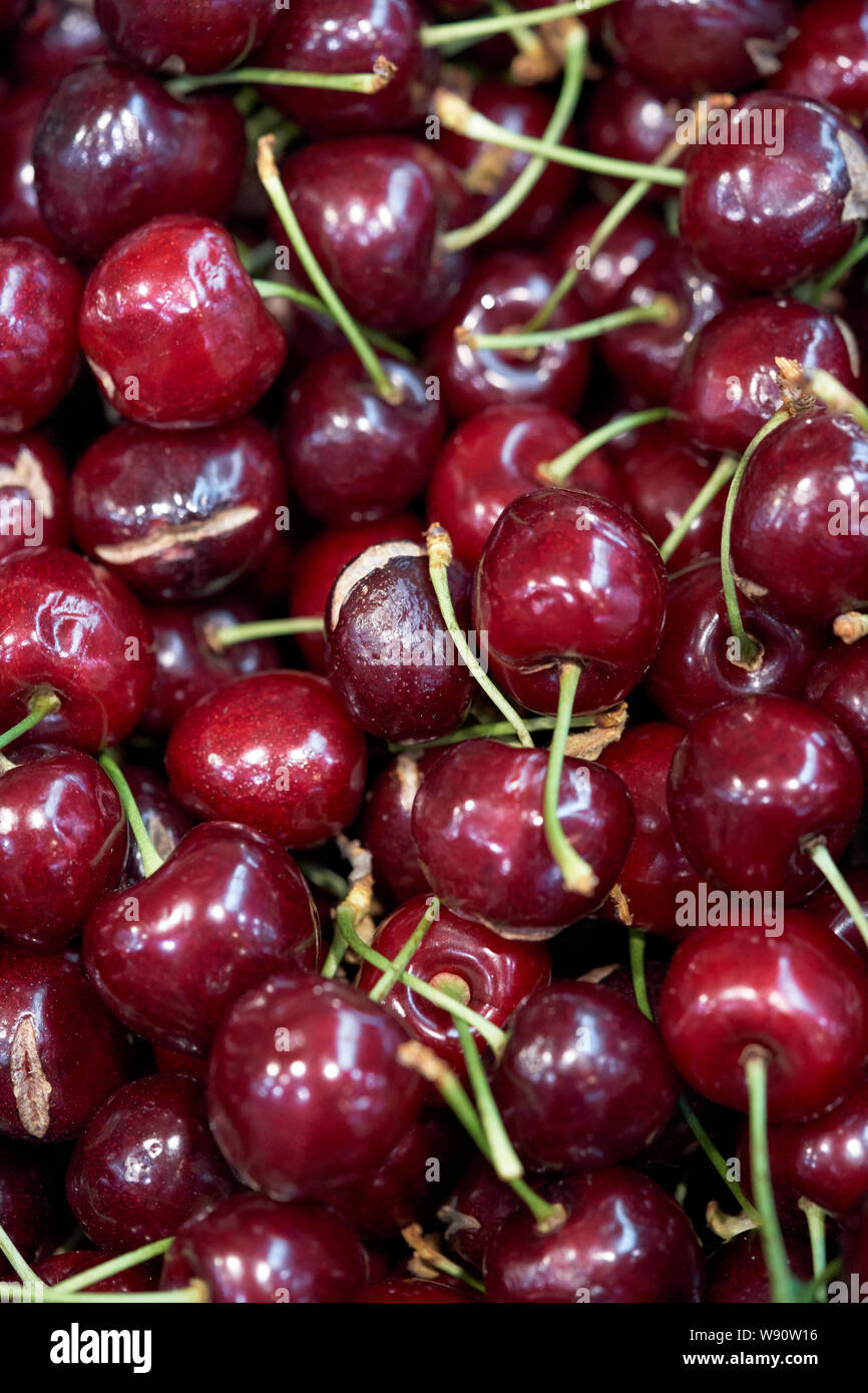 A group of red cherries Stock Photo Alamy