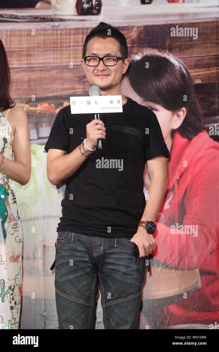 Taiwanese directorsGiddens Ko smiles during a press conference for his new movie 'Cafe.Waiting.Love' in Taipei, Taiwan, 13 August 2014. Stock Photo